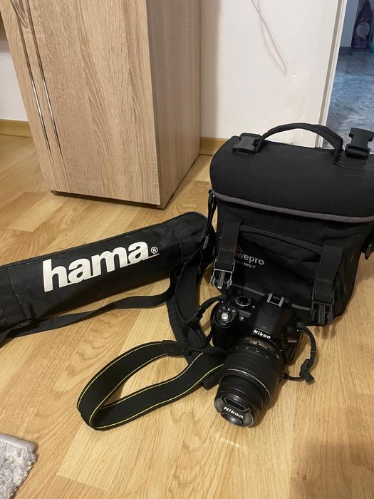 Set complet aparat foto DSLR Nikon D3100