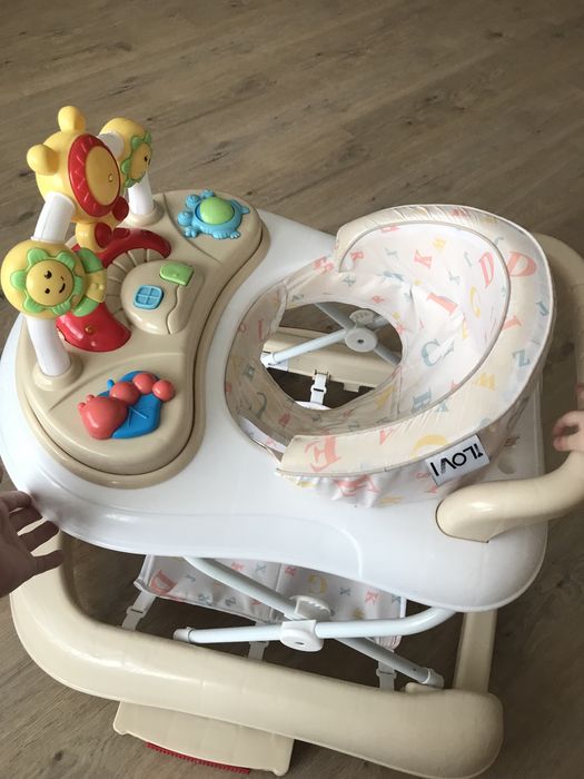 Детский фирменный ходунок в отличном состоянии