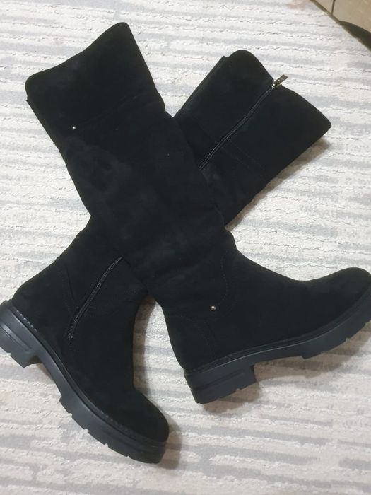 Продам сапоги новые