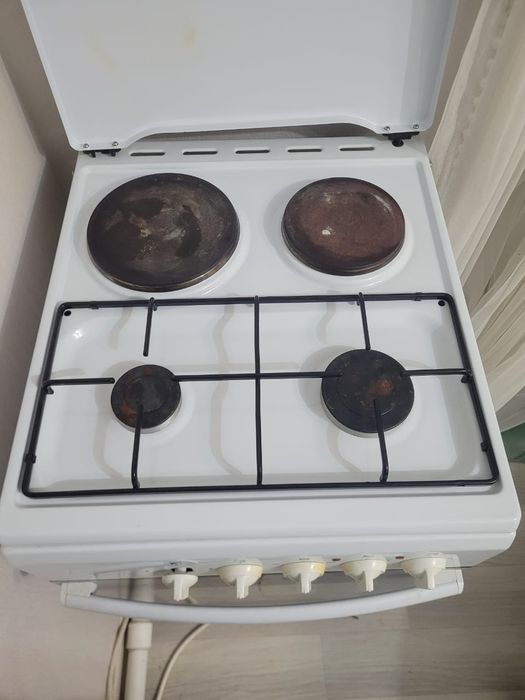 Продам комби печку в отличном состояний