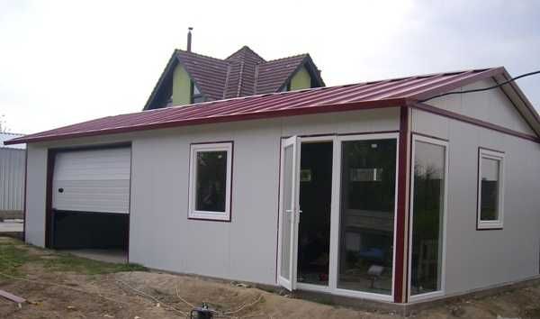 Casa modulara și garaje auto din structura metalica si panou sandwich