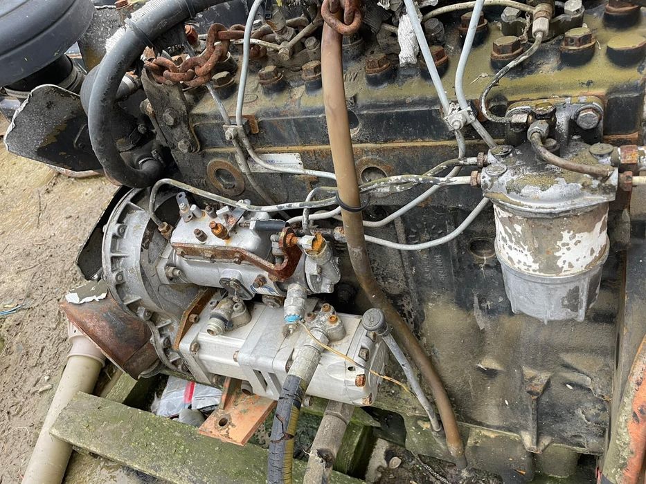 Motor buldoexcavator Caterpillar