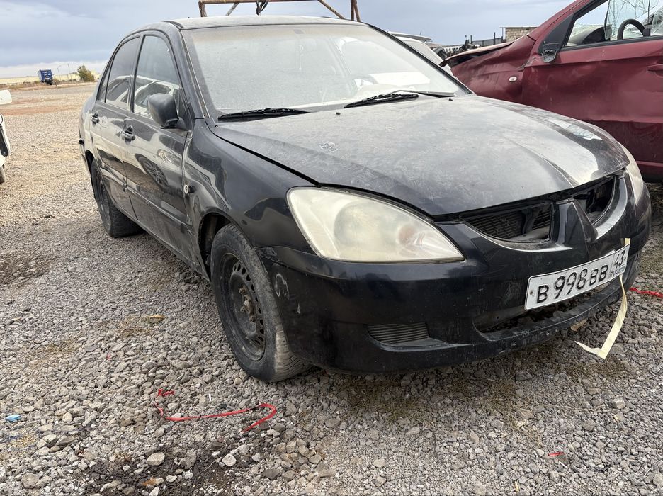 Митсубиси Лансер