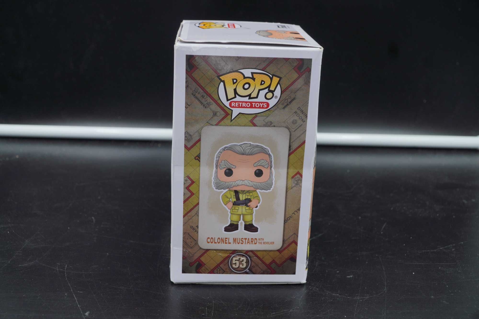 Figurina funko pop Colonel Mustard din Clue