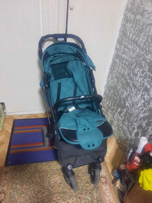 Продам коляску бирюза
