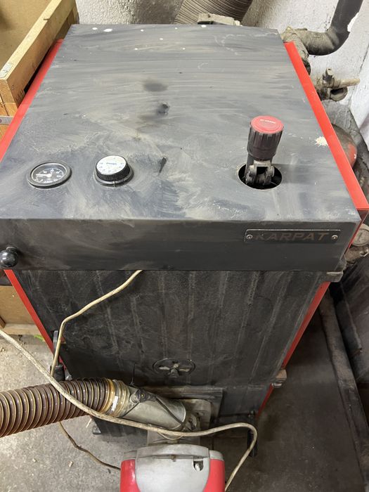 Котел на твърдо гориво и пелети с горелка Карпат + Ferroli P7