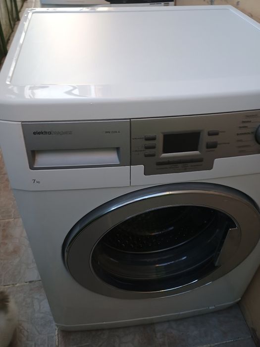 Mașină de spălat rufe clasa AA verticală AEG