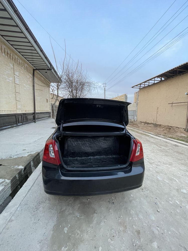 Lacetti 1.8 qora rang 2 poz