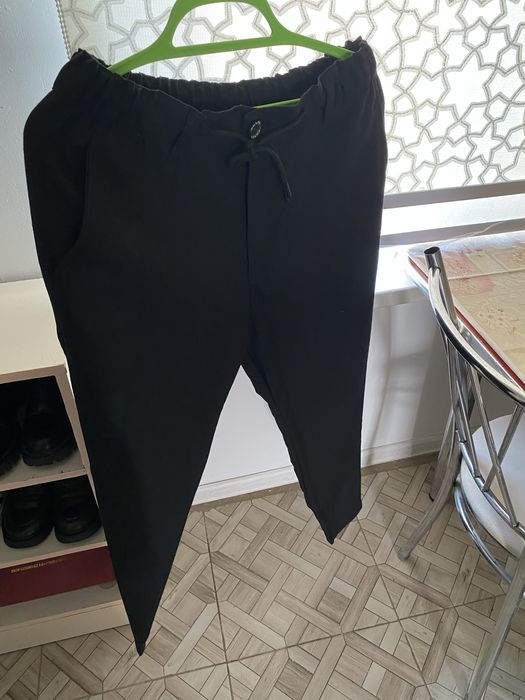 новые неношеные брюки