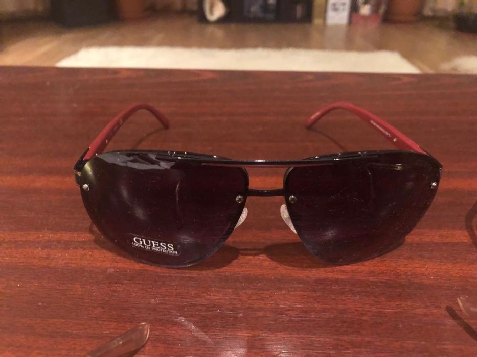 Vand ochelari de soare originali unisex GUESS ,polarizati