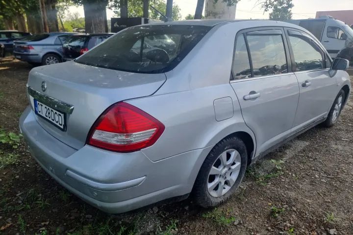 bara spate capota portbagaj armatura spate aripa spate usa portiera stanga dreapta fata spate far dreapta  Nissan Tiida C11 motor 1.6 benzina 110cp cod HR16DE  Dezmembrez