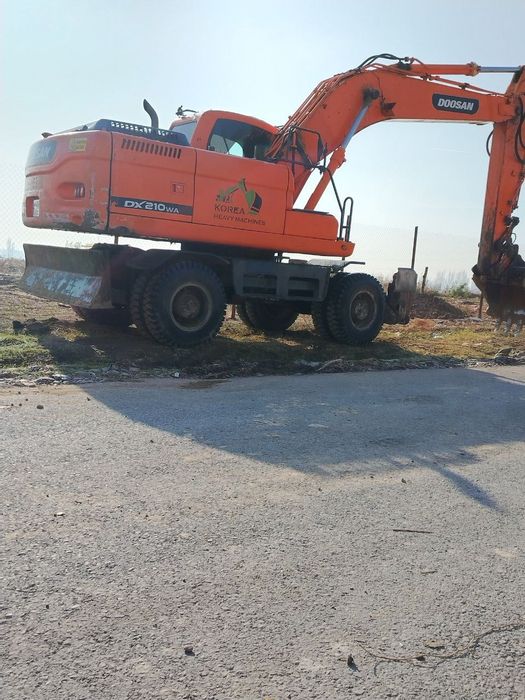 Доосан колёсный эксковатор 210 инжектор матор сотилади холати яхши
