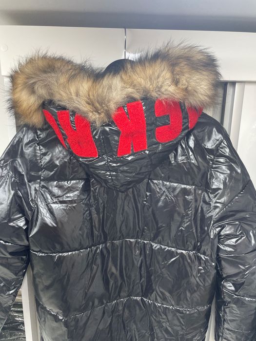 Дамско зимно яке с естествен косъм на качулката