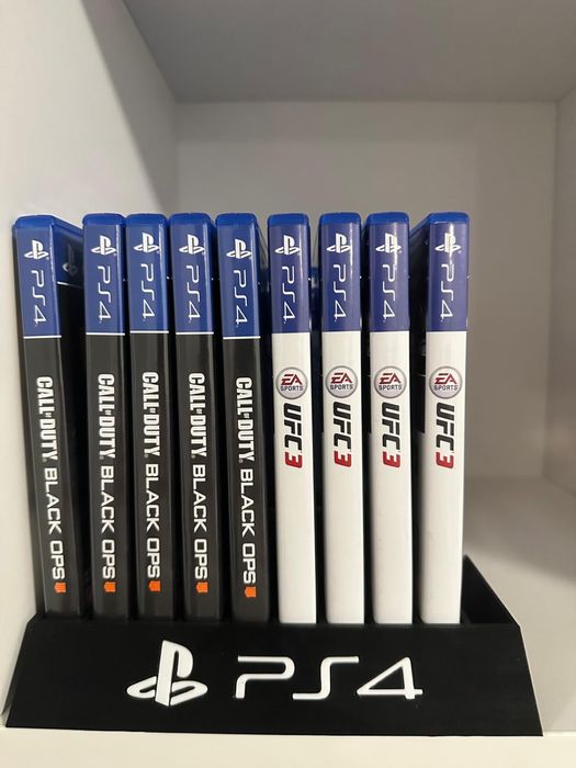 PlayStation 4 Slim 512GB + 2 manete + 5 jocuri (ca nou)