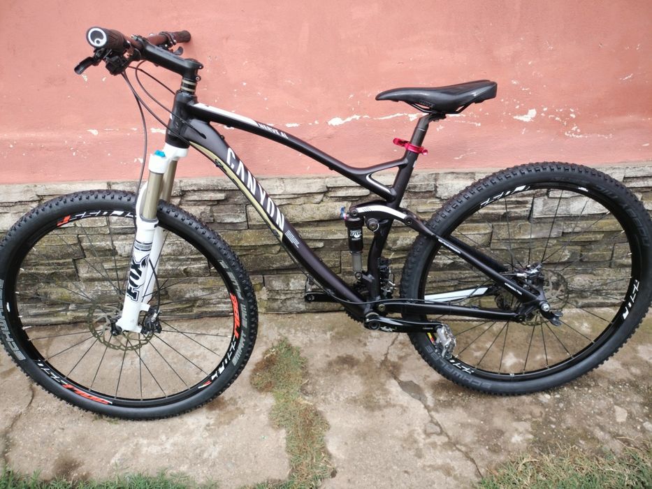 Bicicleta Full suspensie roti 29