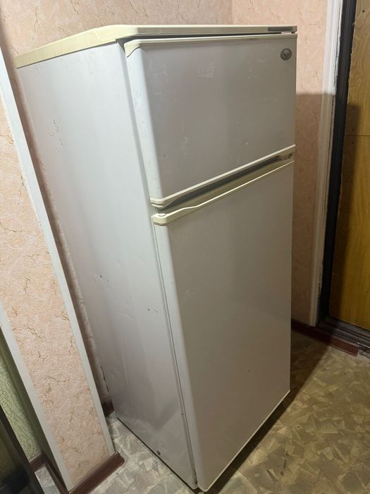 Холодильник не новый