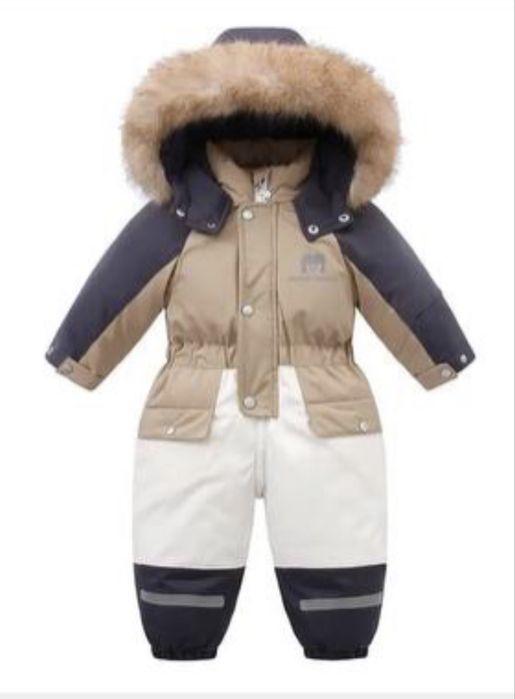 Продаетсч зимний детскиц комбинезон и сапожки
