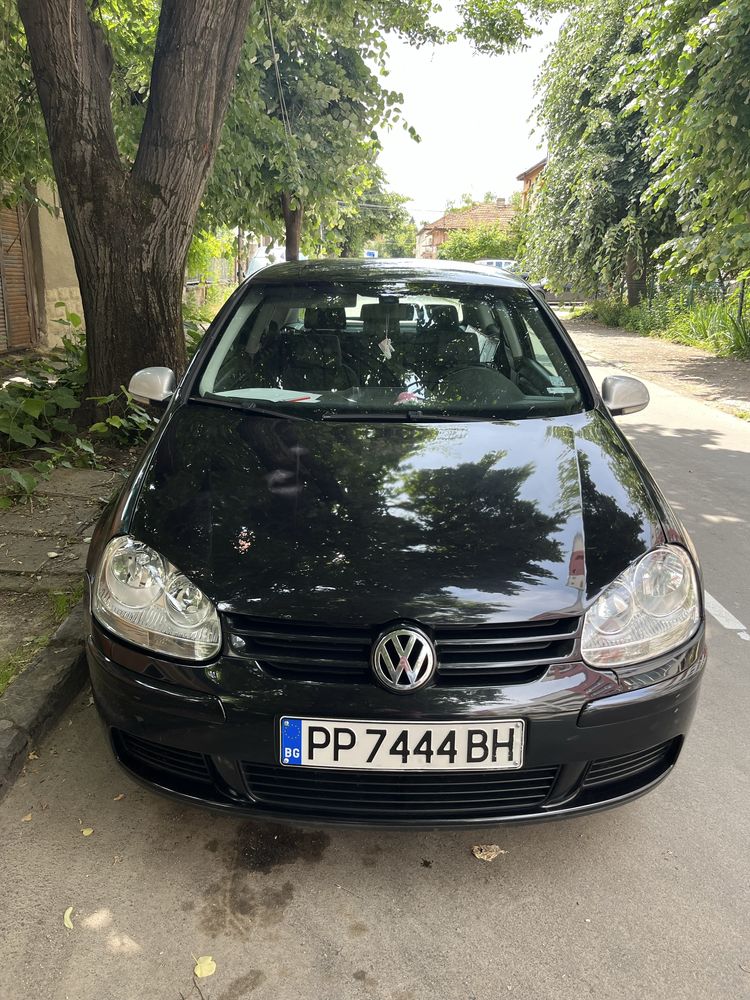 Golf 5  1.6 fsi.