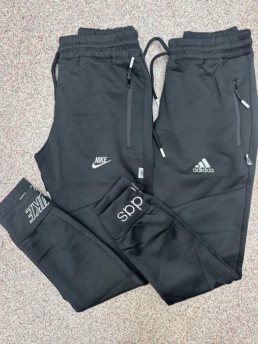 Set 2 perechi pantaloni bărbătești .