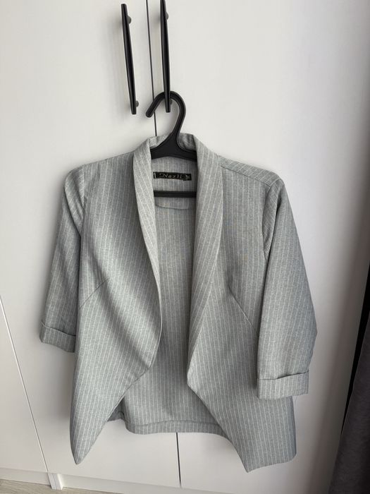 Костюм. Размер на с/м. Цена 7000тыс. Почти новый