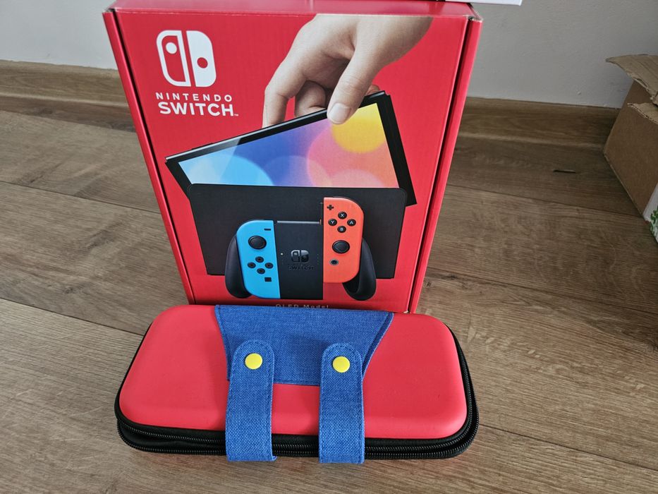 Nintendo Switch OLED – ca nou, garanție emag 2026 + multe accesorii