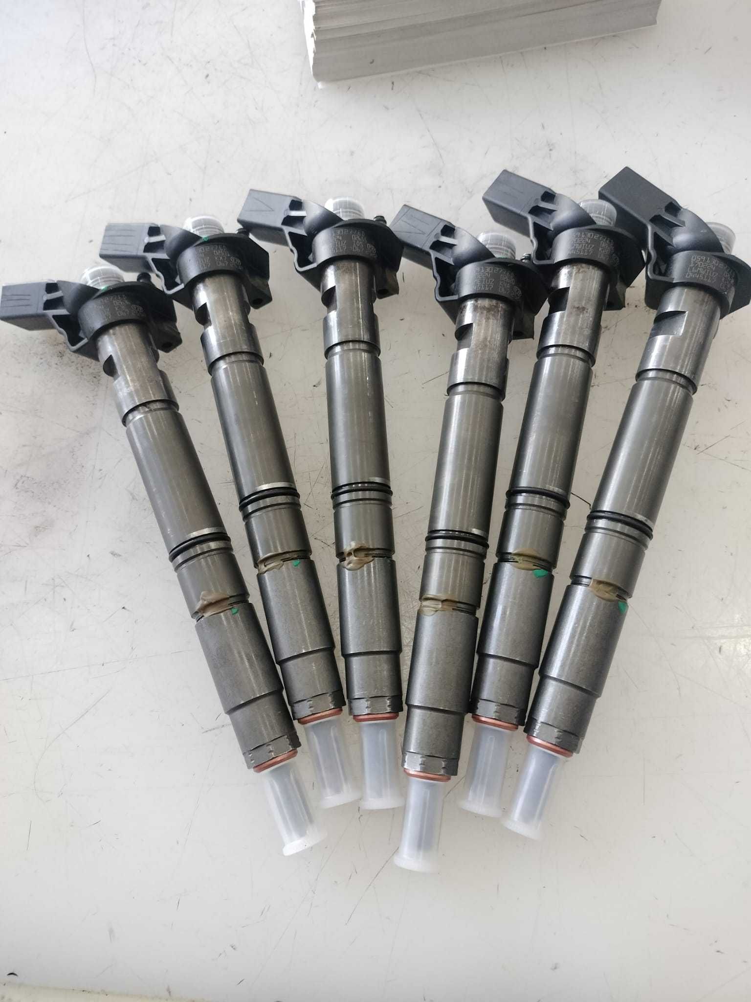 Set 6 injectoare Audi A4 / A6 / A7 / Q7 3.0 d reconditionate.