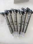 Set 6 injectoare Audi A4 / A6 / A7 / Q7 3.0 d reconditionate.