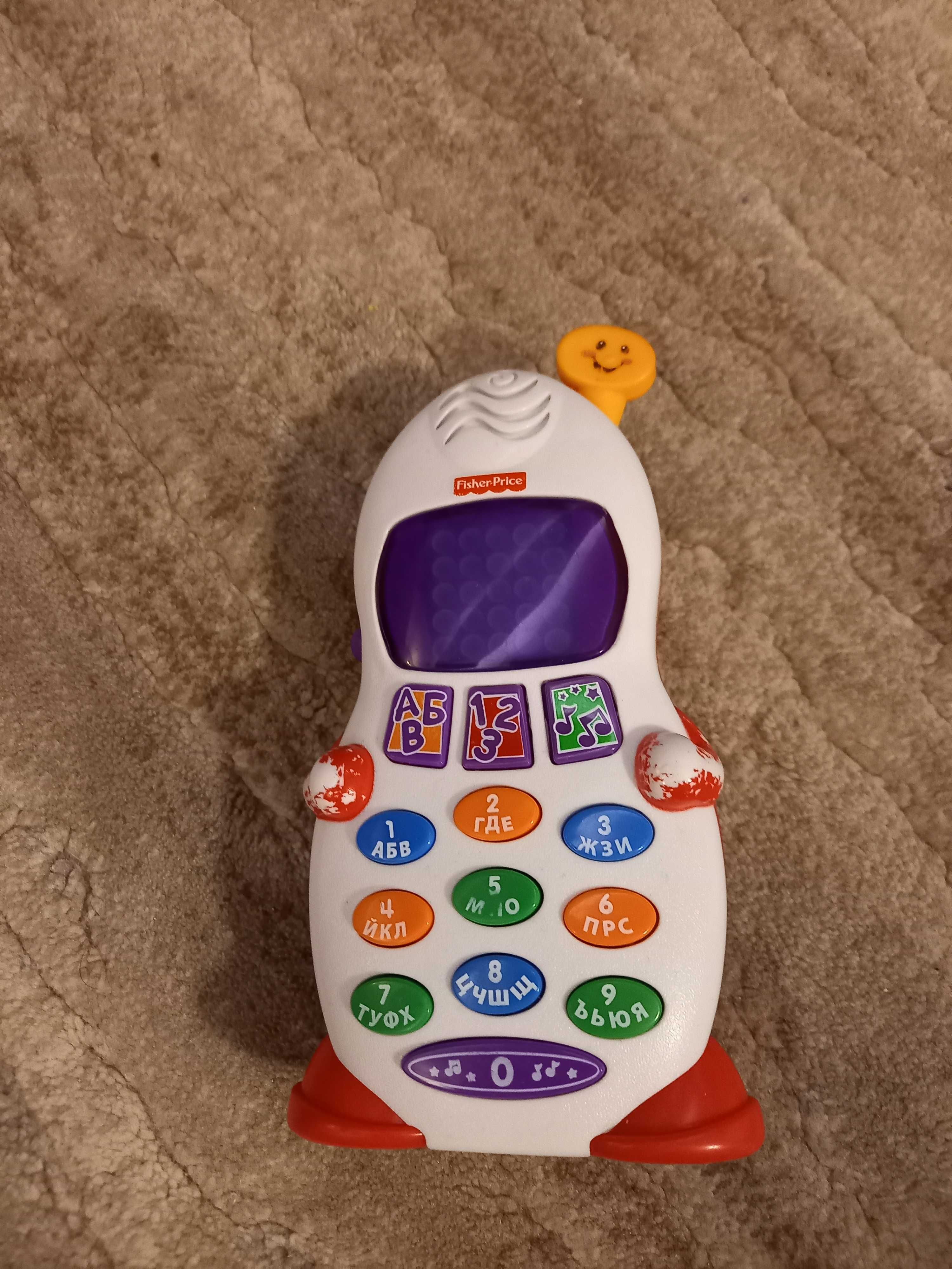 Образователна играчка телефон на Fisher Price и детски конструктор