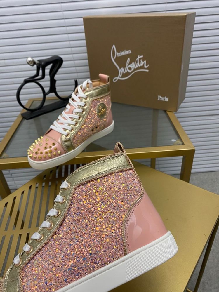 Louboutin “WMNS”