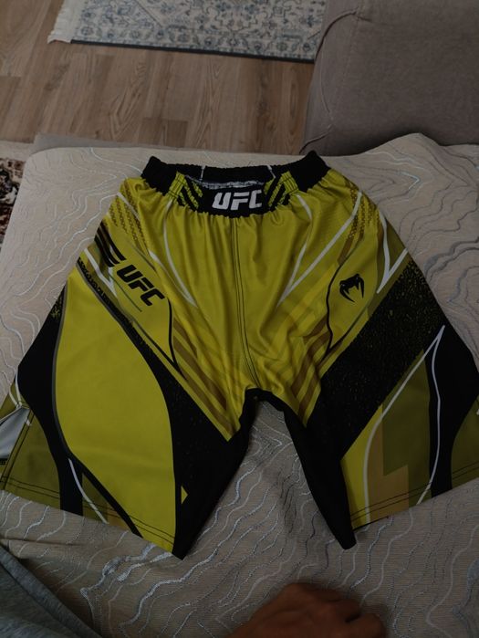 Продаю шорты UFC желтый