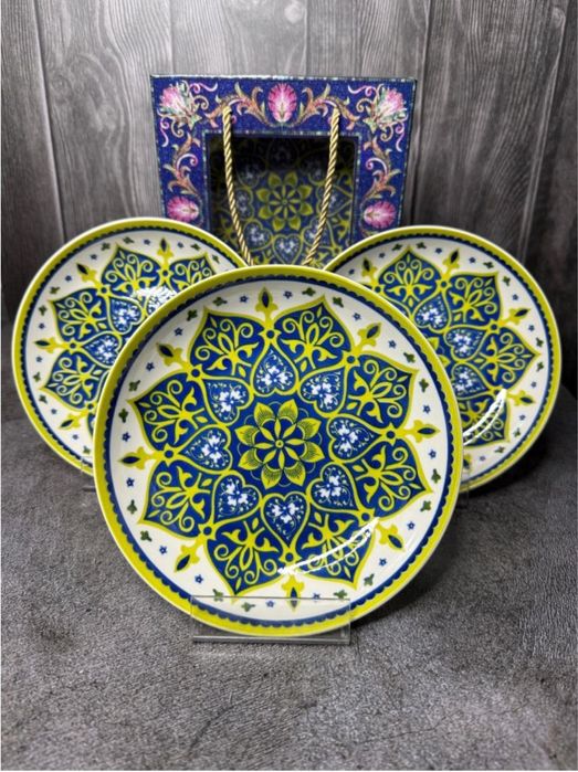 Продам набор керамических тарелок