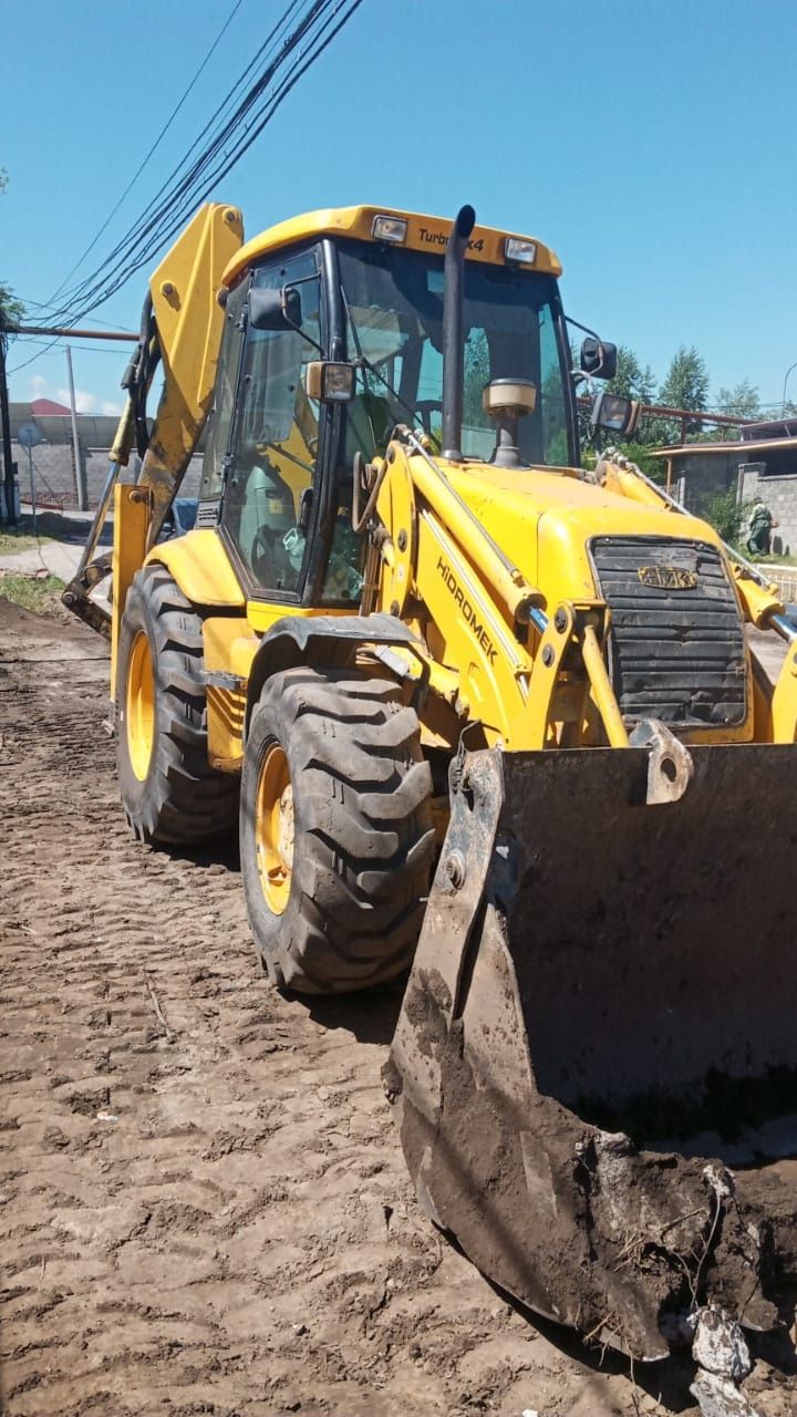 Аренда услуги трактор 3в1 экскаватор. Гидромолот. Отбойник.