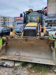 Vind buldoexcavator Caterpillar 428F