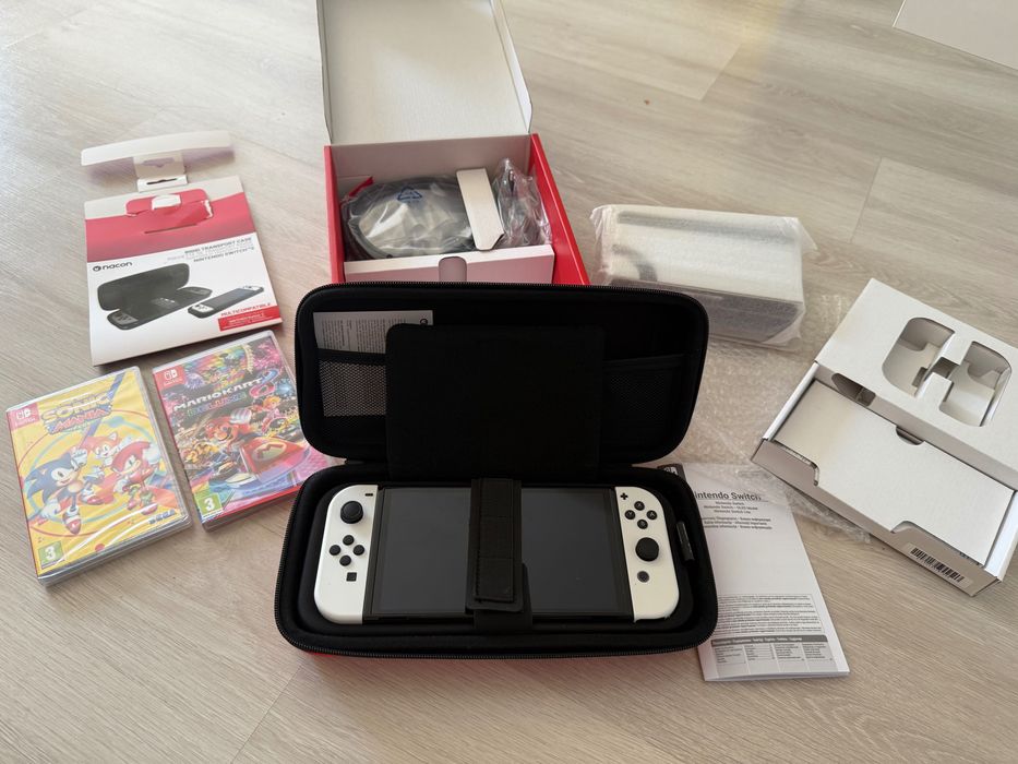 Nintendo switch нов, в комплект игри, калъф с гаранция