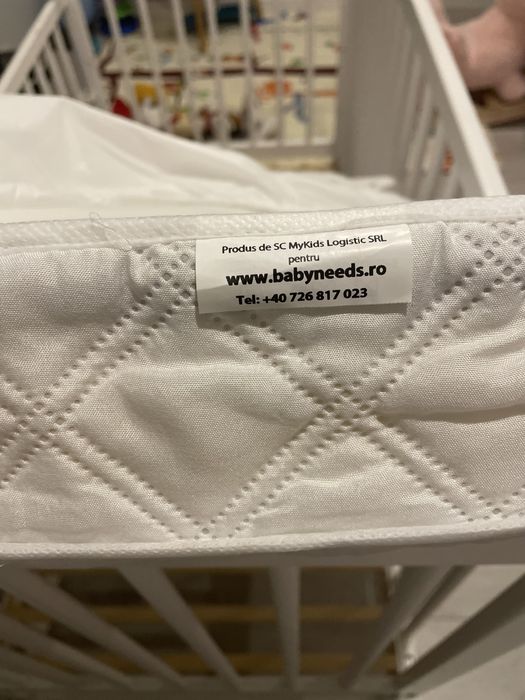 Patuț Baby needs(laterală culisantă)+ saltea Cocos conf.