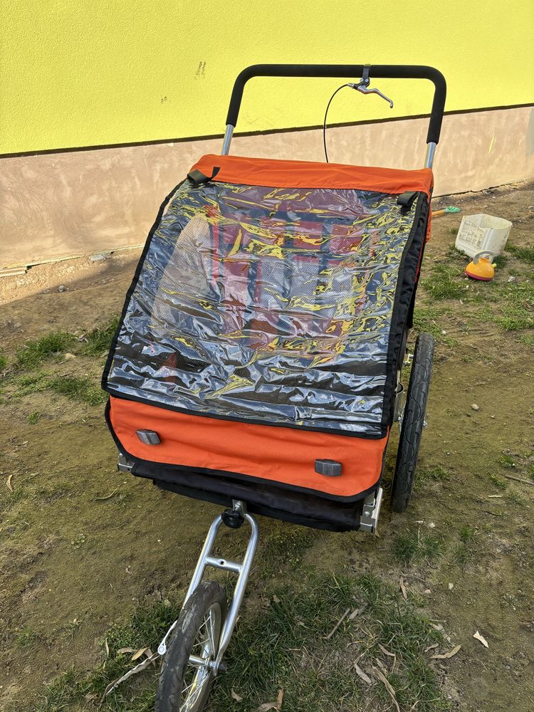 Remorca bicicleta copii