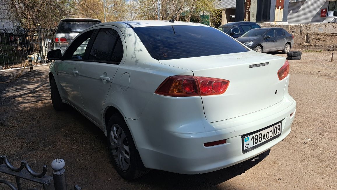 Митсубиси лансер Mitsubishi Lancer 10