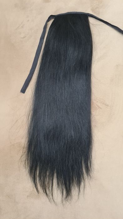 Coada din par natural, lungime 60 cm, folosita doar de 2 ori, în stare