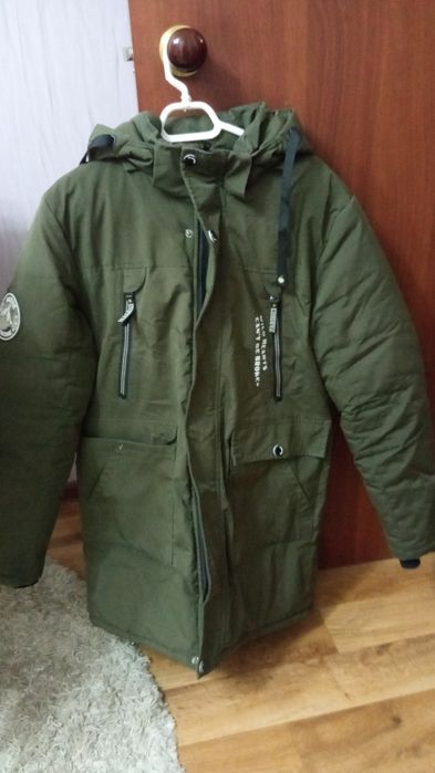 Пуховик теплый ,размер 48,б у ,теплый,в хорошем состоянии