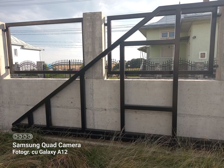 Poarta autoportanta si pe sina la comanda