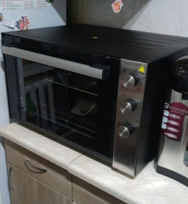 Срочно продам Настольную электропечь Kumtel lX-9326 черный, стальной,