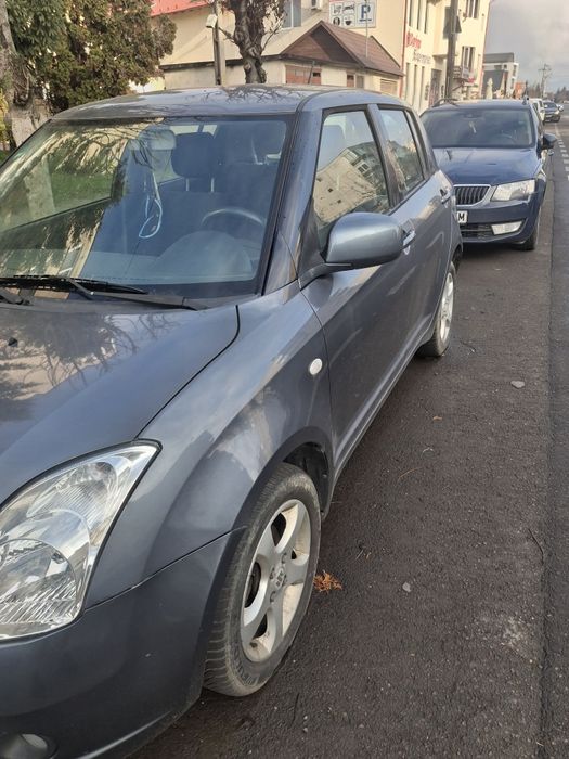Vind Suzuki Swift 4x4 an fabricație 2008
