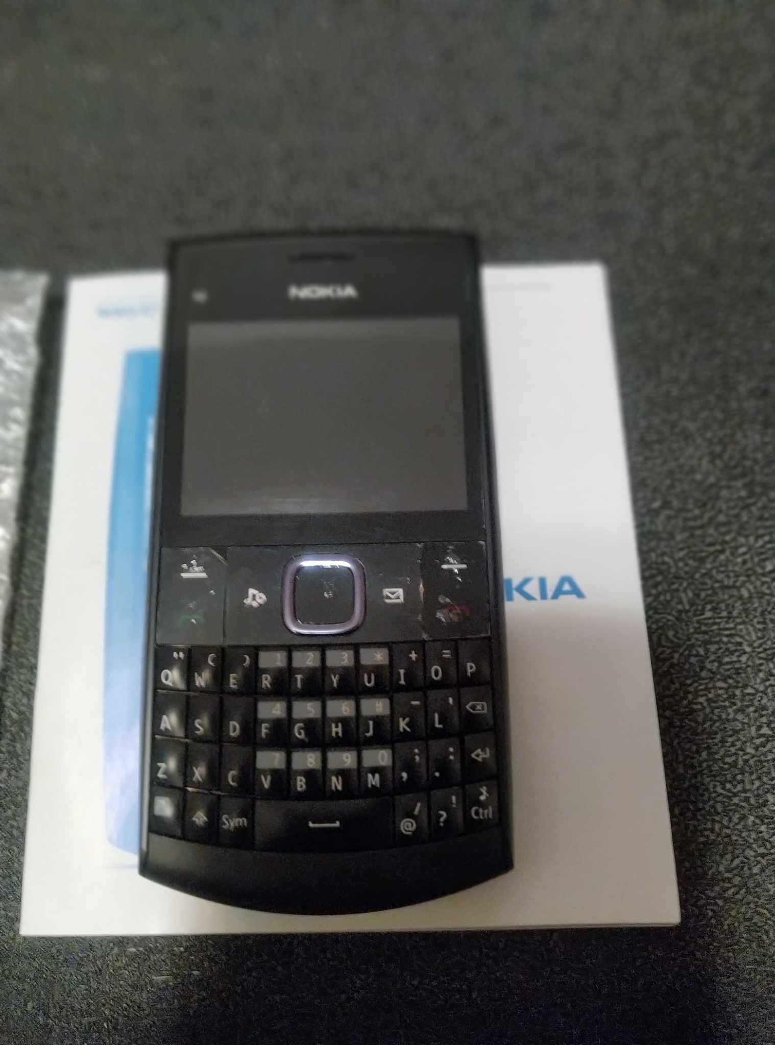 Телефон Nokia X2-01 QWERTY-клавиатура, microSD, Bluetooth. 0.3MP черен