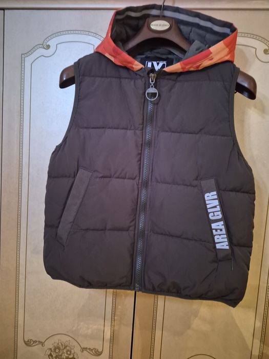 безрукавка пуховик на подростка