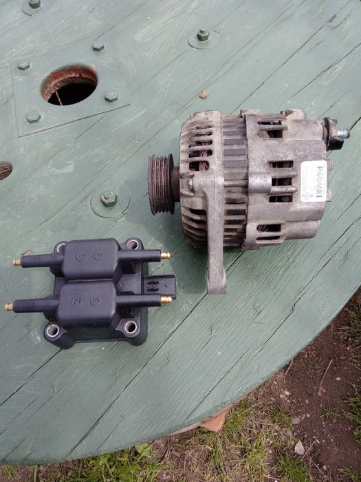 Vând alternator,radiator sandero 1,4.Bobina de inducție  Chrysler PT.