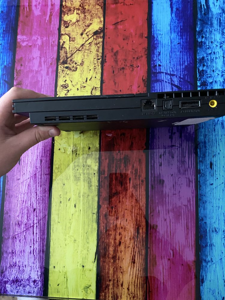 PlayStation 2 Slim, stare buna estetic.
