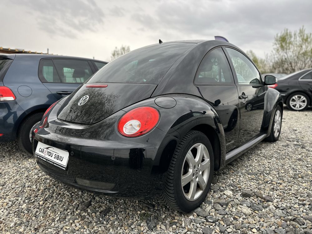 Vw new beetle 1.6i 2008 12 luni Garantie Rate