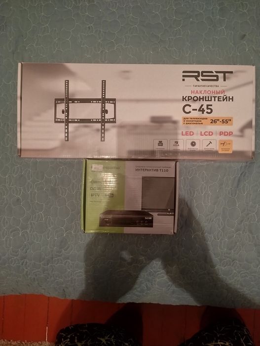 Продам новый кронштейн и тюнер