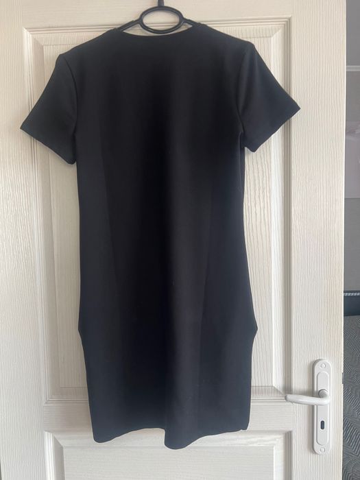 Дамска рокля с джобчета.