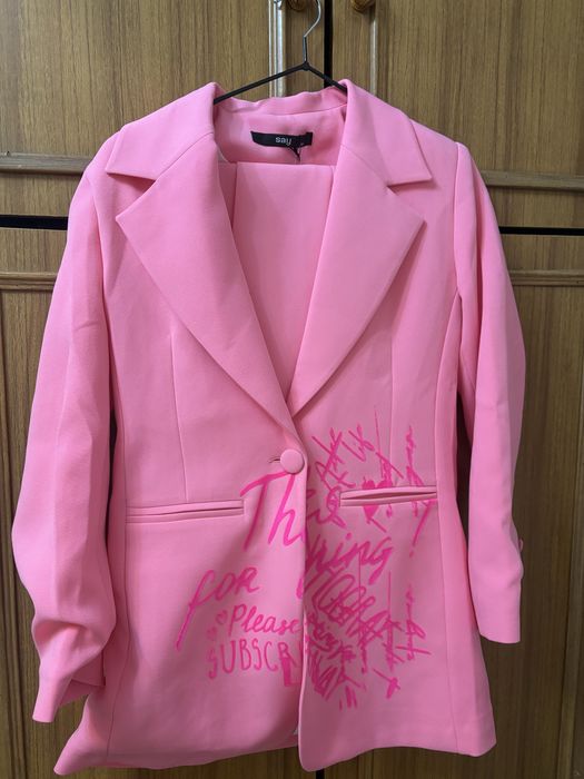 Продам костюм брючный